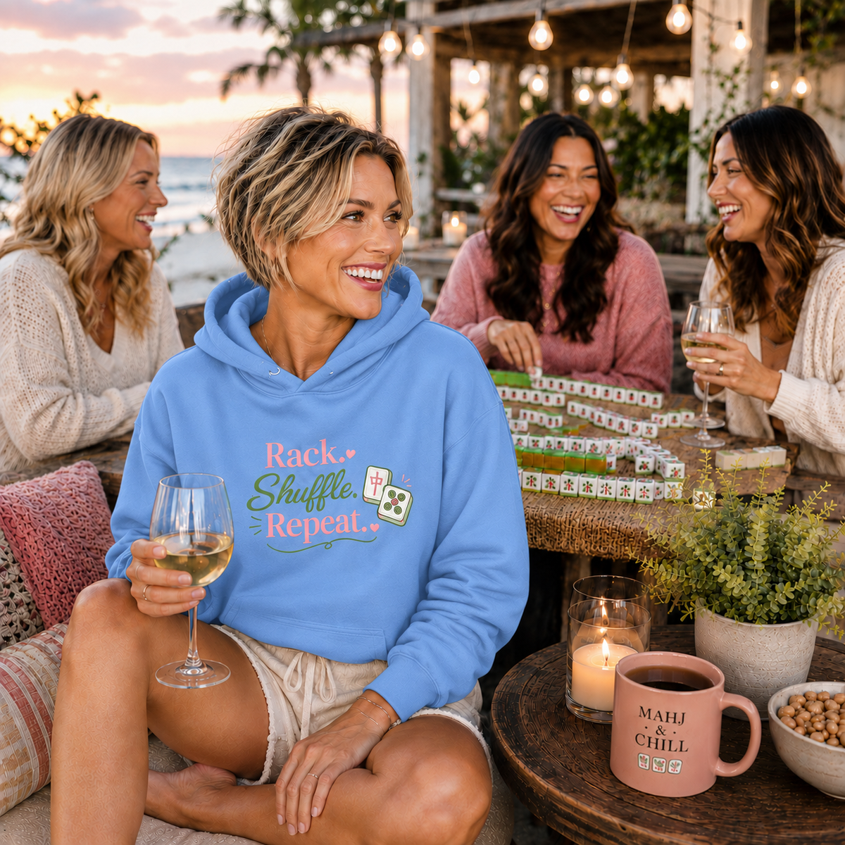 Woman wearing the Rack Shuffle Repeat hoodie in Carolina blue